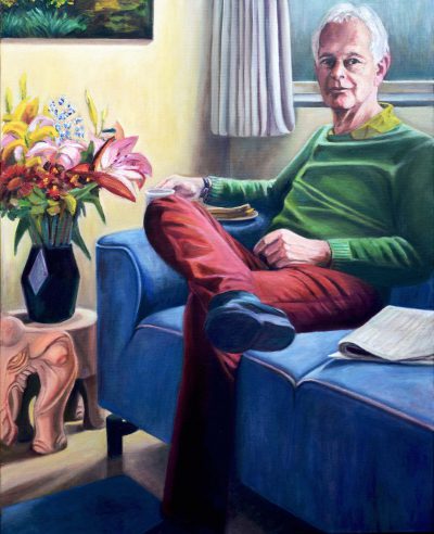 afbeelding van portret van man met rode broek op bank